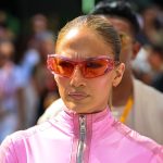 Jennifer Lopez sizzles in baby pink leather catsuit to meet F1 drivers